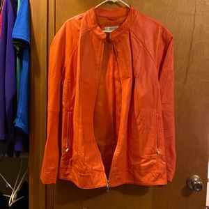 Orange lightweight leather jacket with mandarin collar and zipper on cuffs